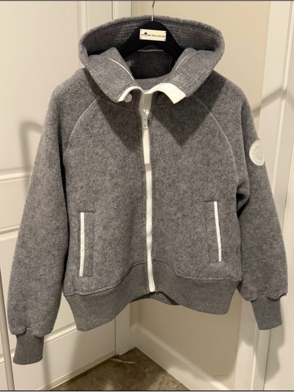 C.Goose Grey jacket with white trim